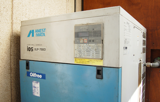 株式会社日進工機